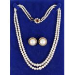 A pearl necklace with 9ct gold clasp, comprising two rows of graduated cultured pearls, measuring