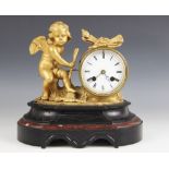 A 19th century French Japy Freres gilt metal mantel clock, the drum type clock with a 9cm white