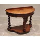A Victorian mahogany demi lune side table, the moulded top above a frieze applied with a blind