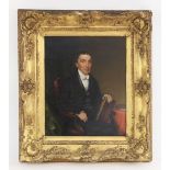 English school (19th century), A half length portrait of a seated gentleman holding a book, Oil on