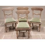 A set of four mid 19th century painted dining chairs, possibly Scandinavian, each with a concave
