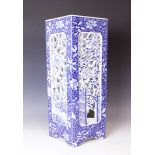 A Japanese Arita porcelain stick stand, Meiji period (1868-1912), decorated in a blue and white