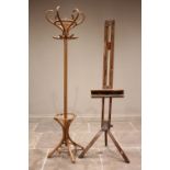 A beech wood artist's easel, with wing nut adjusters, 104cm high, along with a modern beech bentwood
