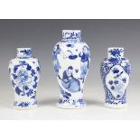 Three Chinese blue and white porcelain vases, 19th century, each of baluster form, individually