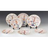 Five Crown Derby kakiemon pattern wares, early 19th century, comprising: two plates, each 21cm