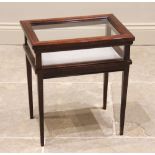 A mahogany bijouterie cabinet, 20th century, of diminutive proportions, the hinged top opening to