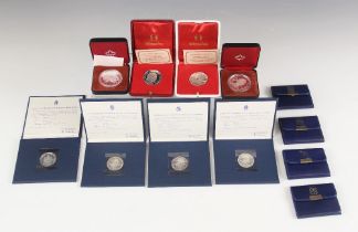 A selection of silver commemorative coins, to include four silver 500 lire coins commemorating the V