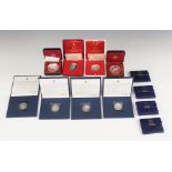 A selection of silver commemorative coins, to include four silver 500 lire coins commemorating the V