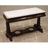 A Victorian mahogany marble top washstand, the marble slab top with a moulded edge above a pair of