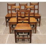 A well matched set of six honey oak country chairs, early 19th century, each with a rail back