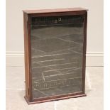 An early 20th century 'Ashtons & Parsons' homeopathic table top display case, the single glazed door