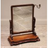 A Victorian mahogany dressing table mirror, the plain moulded rectangular frame applied with a