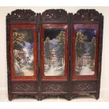 A Japanese carved hardwood and lacquered three panel room screen, early 20th century, each section