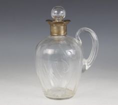 A Victorian cut glass and silver mounted Whisky decanter, James Dudley, London 1895, of inverted