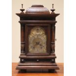 An early 20th century oak cased German bracket clock by Winterhalder & Hofmeier, the architectural