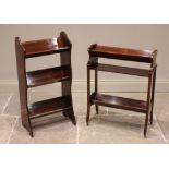 An Edwardian mahogany freestanding book trough, the three tiers on shaped serpentine supports,