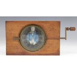 A Victorian mahogany-mounted hand painted rack and pinion magic lantern slide, late 19th century,