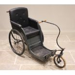 A late 19th/early 20th century coach built invalid carriage/bath chair, the painted wooden body with