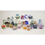 A large selection of glass paperweights, 20th century and later, to include Caithness '