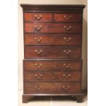 A George III mahogany chest on chest, the dentil cornice with a plain frieze upon the upper chest