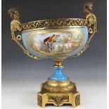 A large Sevres porcelain ormolu mounted table centrepiece, the central porcelain bowl finely