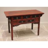 A Chinese stained elm altar table, 20th century, the cleated plank top above an arrangement of