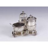 A Victorian silver cruet set and stand, Horace Woodward & Co Ltd, London 1900, comprising wet
