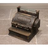 An early 20th century American National brass cash register, serial No. 452935, with makers plaque
