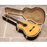 A Concorde classical acoustic guitar, 98cm long, to a fitted hard case
