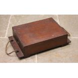 A World War I mahogany ammunition case, of plain rectangular form, with an extended base to rope
