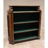 A Victorian walnut open bookcase, with a baize lined interior, the recessed top shelf enclosed by