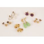 A selection of vintage dress earrings, to include a pair of ruby set gold coloured floral clip on