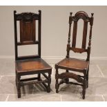 Two oak hall chairs, late 17th/early 18th century, the first with a foliate carved crest rail