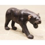 A leather covered panther in the manner of Omersa for Liberty, with glass eyes, modelled standing