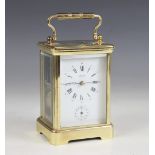 A French lacquered brass repeating carriage clock, the 7cm white dial signed Angelus with subsidiary