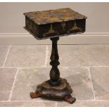 A Victorian papier mache pedestal work box, the hinged top with a scalloped edge opening to a vacant