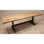 An early 19th century oak refectory table, possibly Welsh, the substantial three plank cleated top