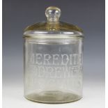 A counter top advertising biscuit jar and cover, early 20th century, of typical form, the body