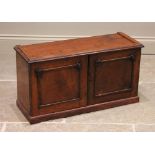 A Victorian mahogany desk top cabinet, the twin doors opening to six pigeon holes and five small