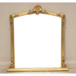 A 19th century style gilt over mantel mirror, later 20th century, the shell moulded crest above an