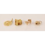 A 9ct gold charm modelled as Westminster Abbey, Cropp & Farr, London 1973, 17mm long, together