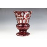 A Bohemian style red flashed glass vase of large proportions, late 19th/early 20th century, of urn