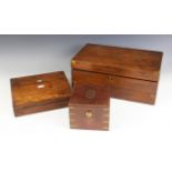 A 19th century mahogany campaign writing box, opening to a skiver inset writing slope with