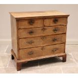 An early 18th century walnut and herringbone banded chest of drawers, the quarter veneered top above