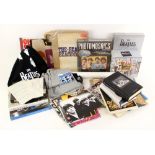 A collection of Beatles memorabilia, to include THE BEATLES ANTHOLOGY book (cellophane wrapped), The