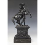 After Guillaume Coustou the Elder (1677-1746), a black painted spelter Marly Horse group, raised