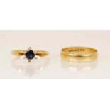 A sapphire and diamond cluster ring, the central round mixed cut sapphire measuring 4.5mm