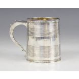 A George III silver christening mug, possibly William Bennett, London 1813, of tapering