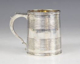 A George III silver christening mug, possibly William Bennett, London 1813, of tapering