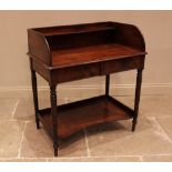 A Regency mahogany wash stand, the rectangular moulded top with a three quarter gallery and rear